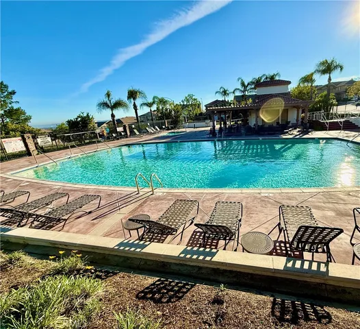 a view of outdoor space with signage and flags