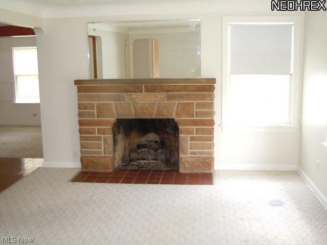 21863 Louis Road Bedford, OH 44146 - Photo 4 of 25 Main house living room with fire place.