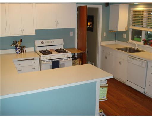 136 Martin Road Pittsburgh, PA 15237 - Photo 13 of 18 Kitchen. THE SPACIOUS KITCHEN OFFERS GAS APPLIANCES, STUNNING HARDWOOD FLOORS AND AND EAT-IN SPACE FOR SIX PLACE SETTINGS.