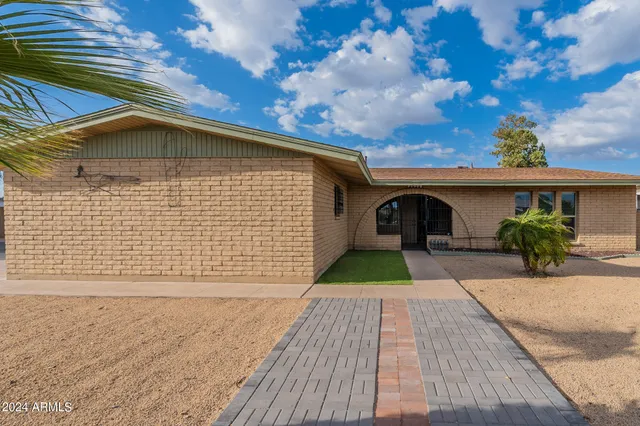 a view of a house with a patio