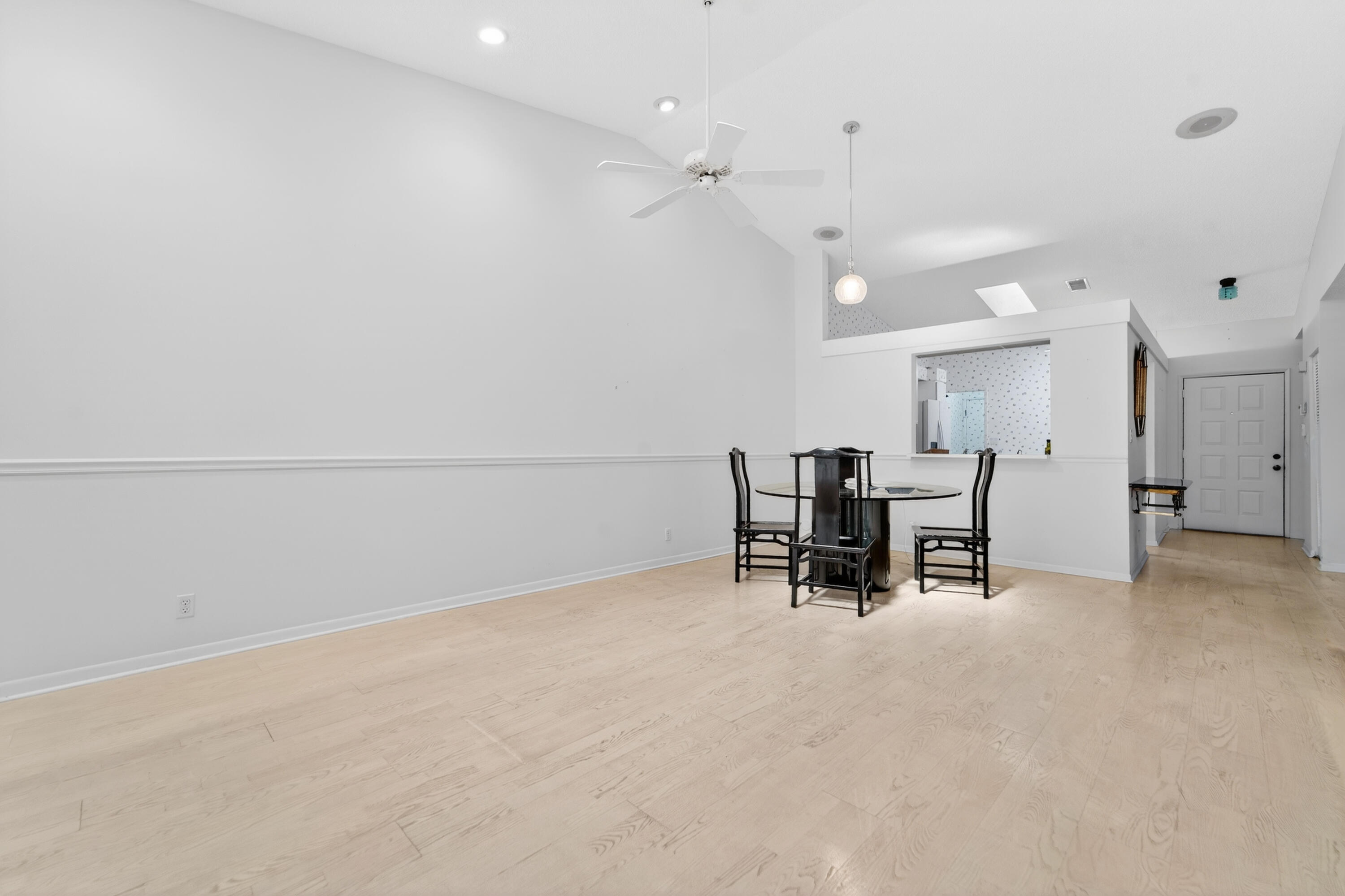 6371 Kings Gate Circle Delray Beach, FL 33484 - Photo 23 of 52 an empty room with furniture and a chandelier fan