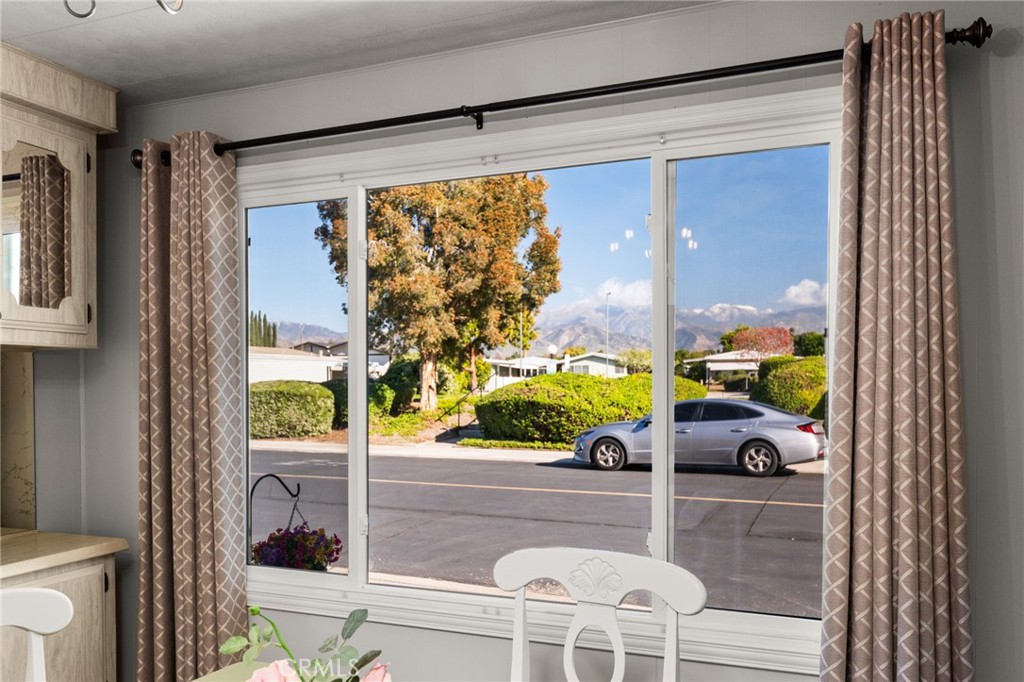 1331 Century Street Redlands, CA 92374 - Photo 9 of 35 a room with a large window and couch