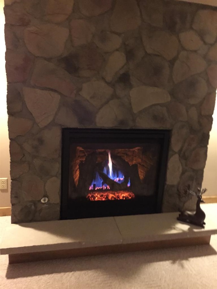 1286 Lake Summerset Road Davis, IL 61019 - Photo 17 of 25 a fireplace with a lamp