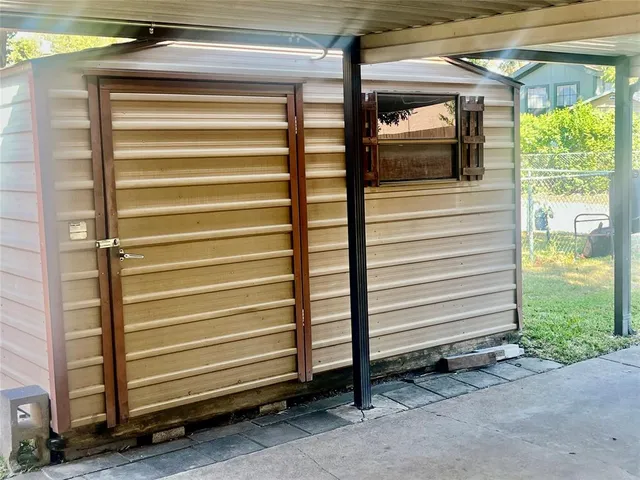 a view of a back yard from a room