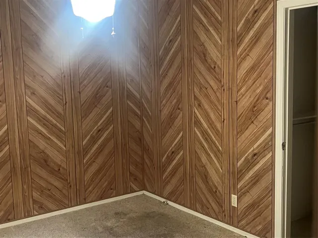 a view of a house with a snow in the backyard