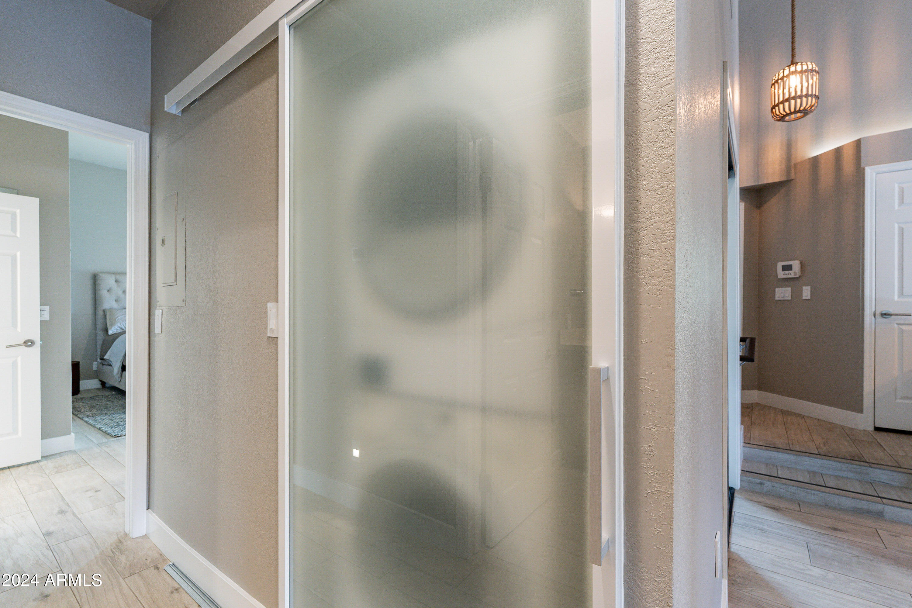 7272 East Gainey Ranch Road, Unit 101 Scottsdale, AZ 85258 - Photo 25 of 36 a view of a walk in closet and bathroom