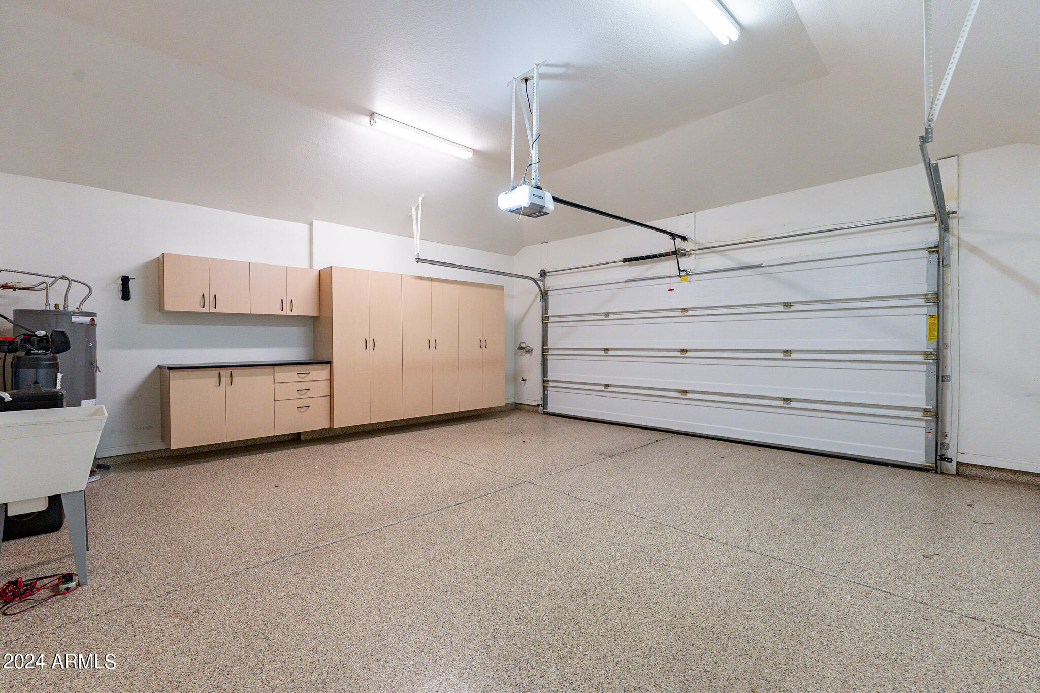 7272 East Gainey Ranch Road, Unit 101 Scottsdale, AZ 85258 - Photo 28 of 36 a view of a room with storage and utility room