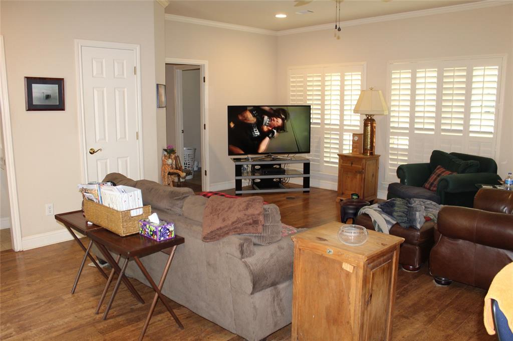 110 Bay Tree Trail Mabank, TX 75156 - Photo 11 of 20 a living room with furniture and a flat screen tv