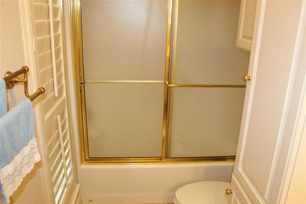 110 Bay Tree Trail Mabank, TX 75156 - Photo 16 of 20 a bathroom with a granite countertop sink and a toilet