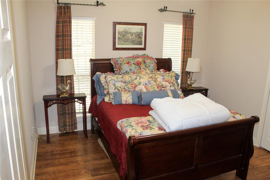 110 Bay Tree Trail Mabank, TX 75156 - Photo 17 of 20 a bed room with a bed and a couch