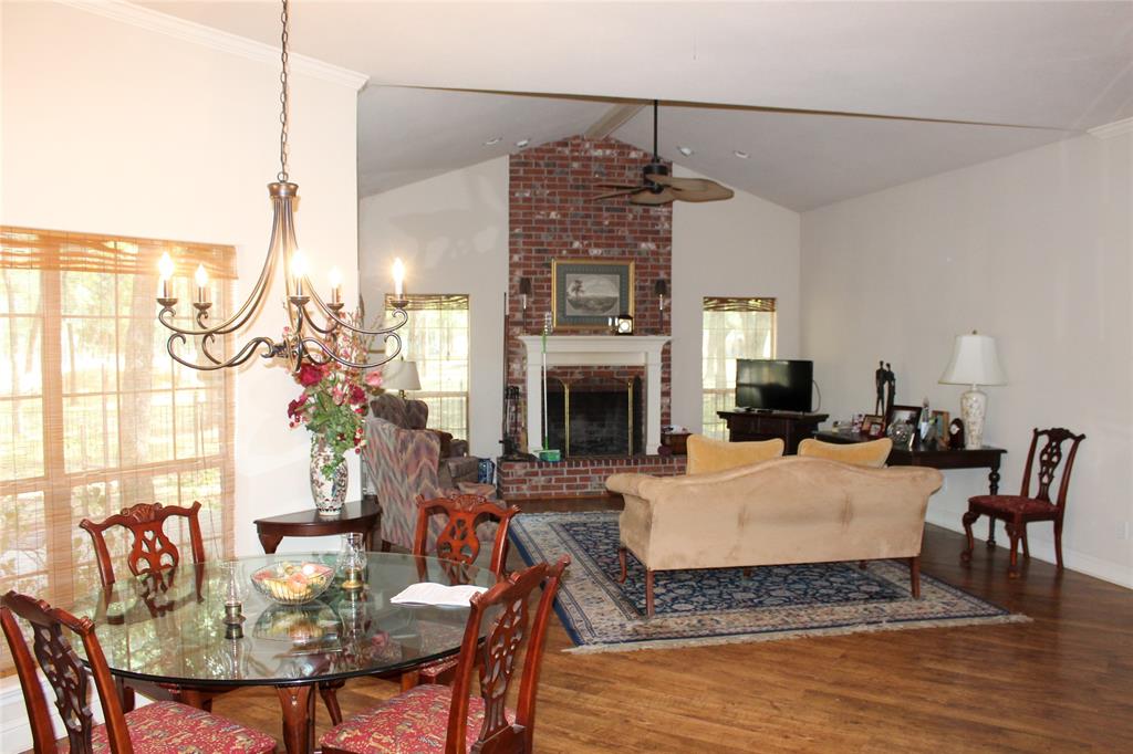 110 Bay Tree Trail Mabank, TX 75156 - Photo 7 of 20 a living room with furniture and a fireplace