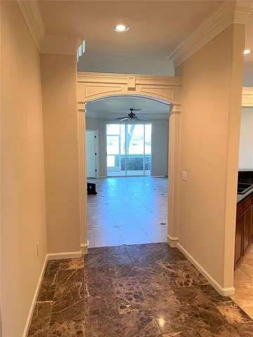 a view of an empty room and window