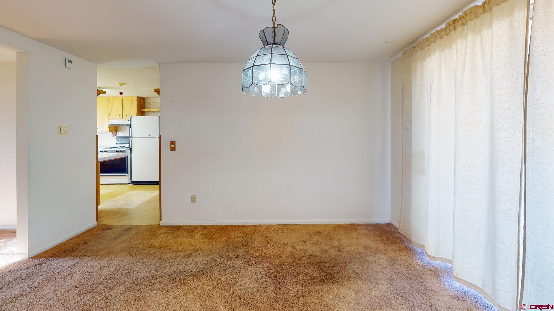 420 30 1/4 Road Grand Junction, CO 81504 - Photo 10 of 13 a view of empty room with wooden floor