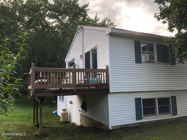181 Matteson Road Bennington, VT 05257 - Photo 20 of 25 a view of a house with a deck