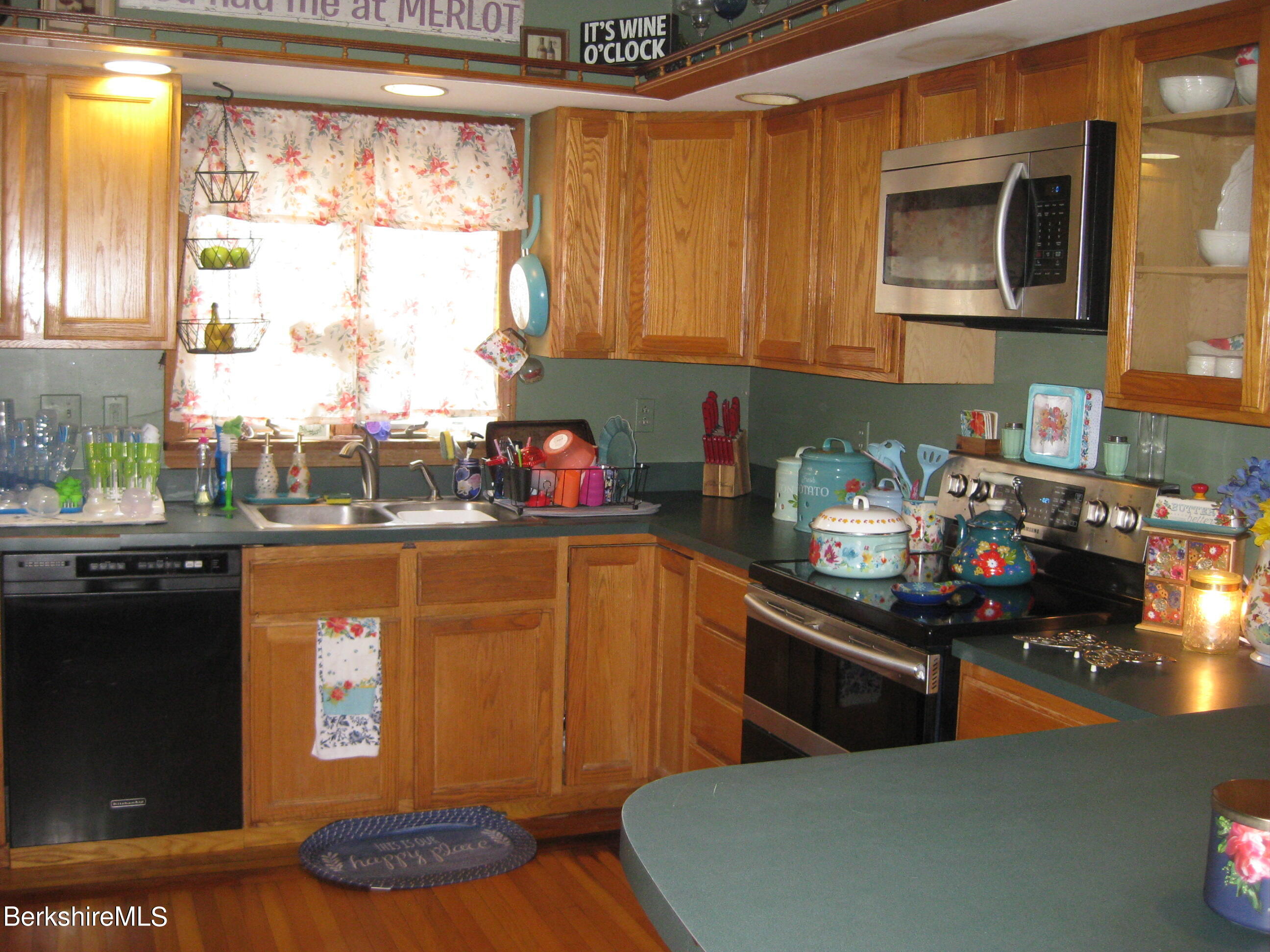 181 Matteson Road Bennington, VT 05257 - Photo 3 of 25 a kitchen with stainless steel appliances granite countertop a refrigerator sink and stove