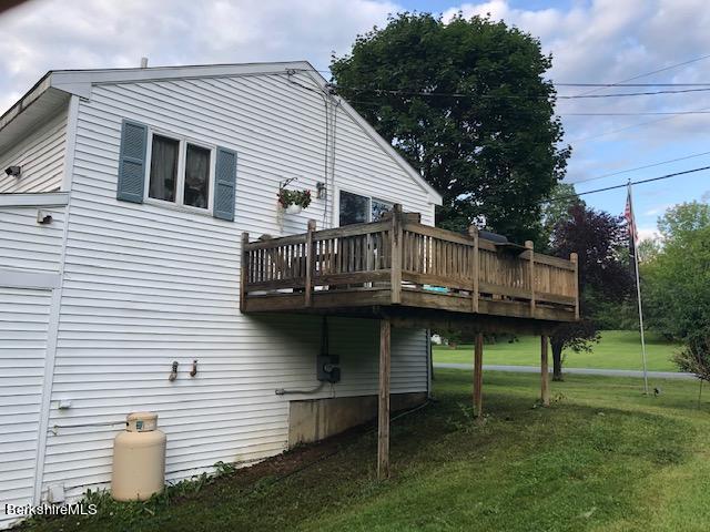 181 Matteson Road Bennington, VT 05257 - Photo 21 of 25 a house view with a garden space