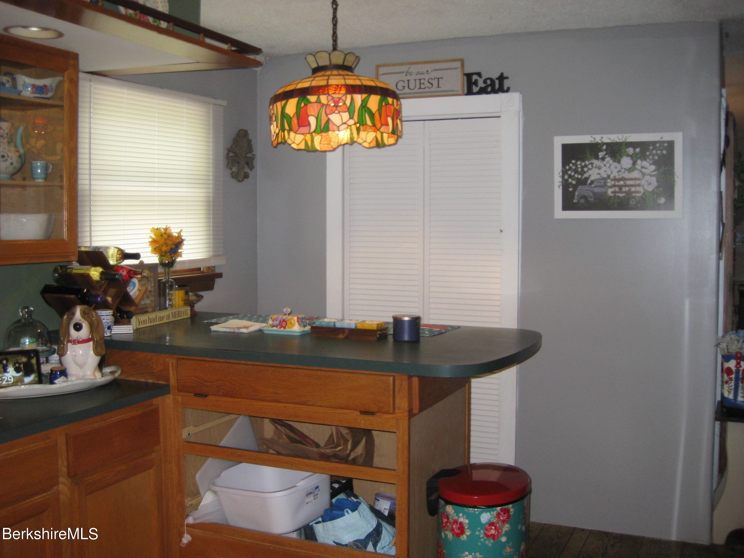181 Matteson Road Bennington, VT 05257 - Photo 5 of 25 a room with furniture and chandelier