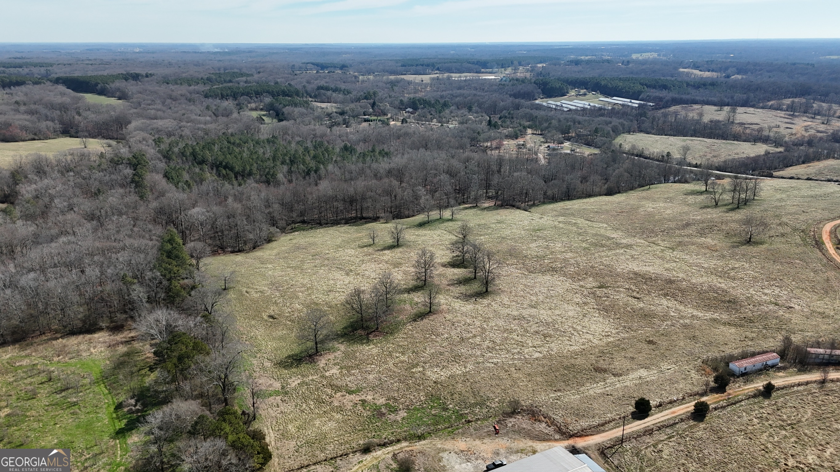 10 Colt Lane Commerce, GA 30530 - Photo 29 of 44 a view of a dry yard with mountains in the background