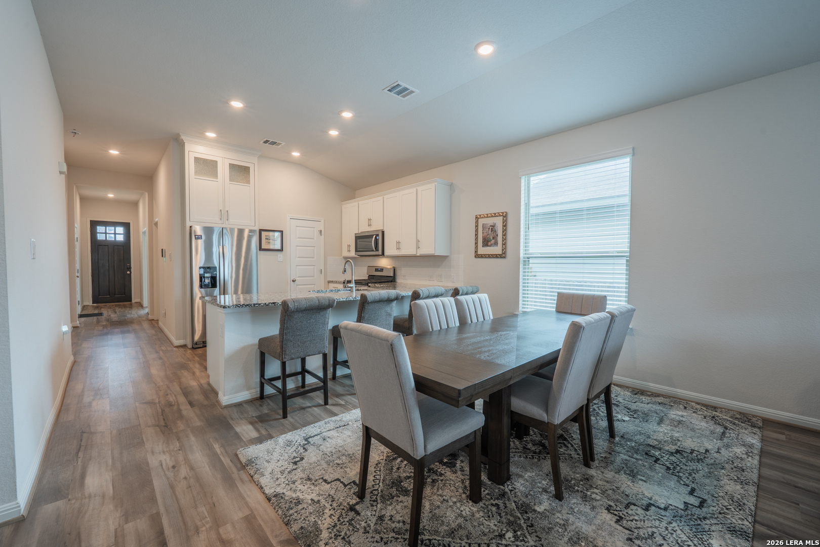 4947 Ranahan Pass St. Hedwig, TX 78152 - Photo 9 of 37 a view of a dining room with furniture