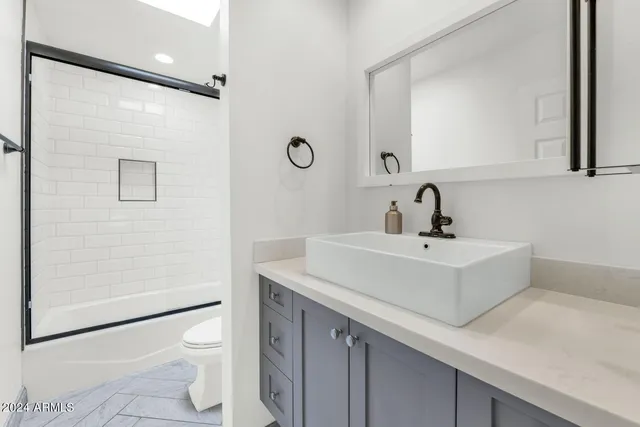 a view of a garden with a house