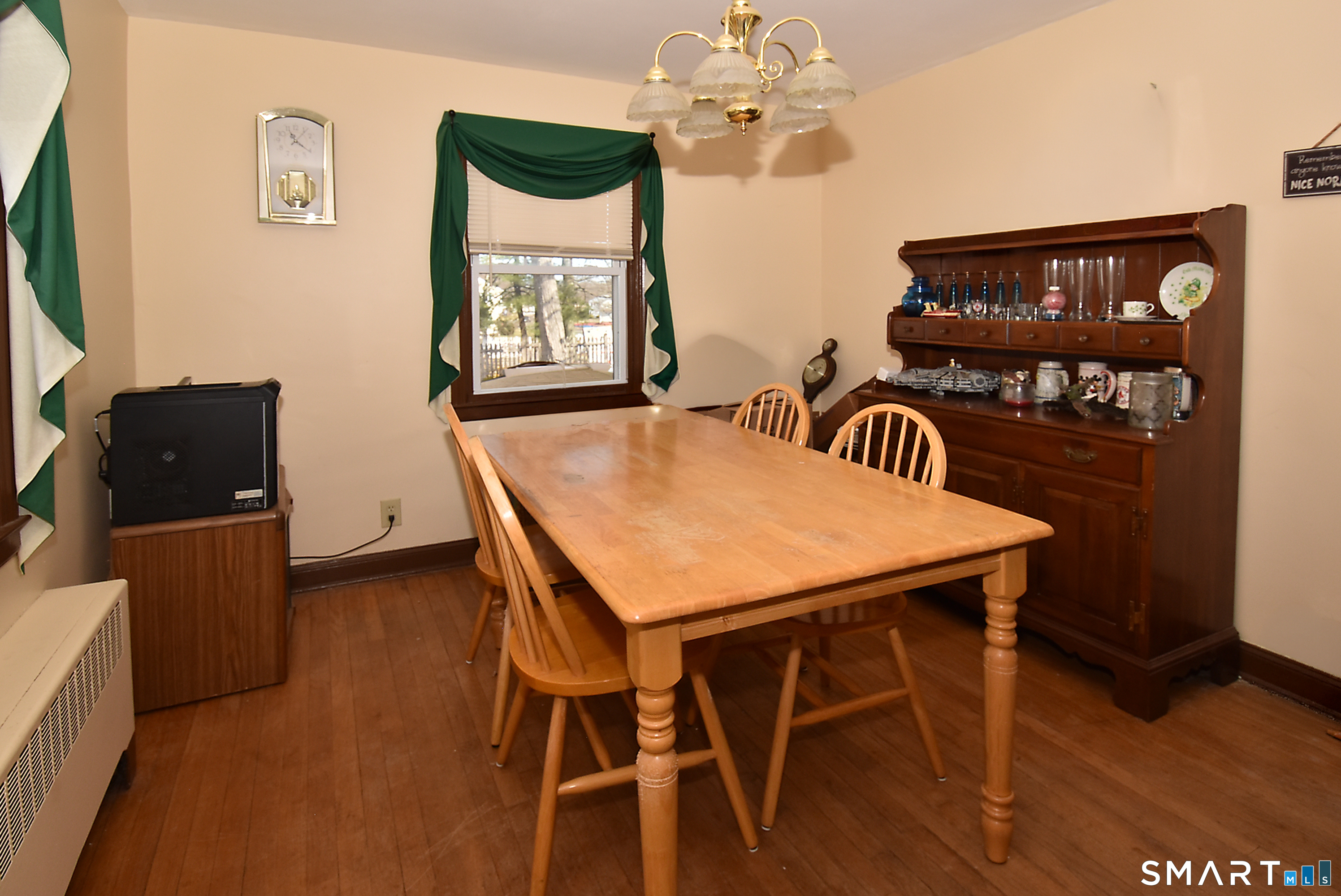 3 French Road Manchester, CT 06042 - Photo 11 of 20 a view of a dining room with furniture and wooden floor