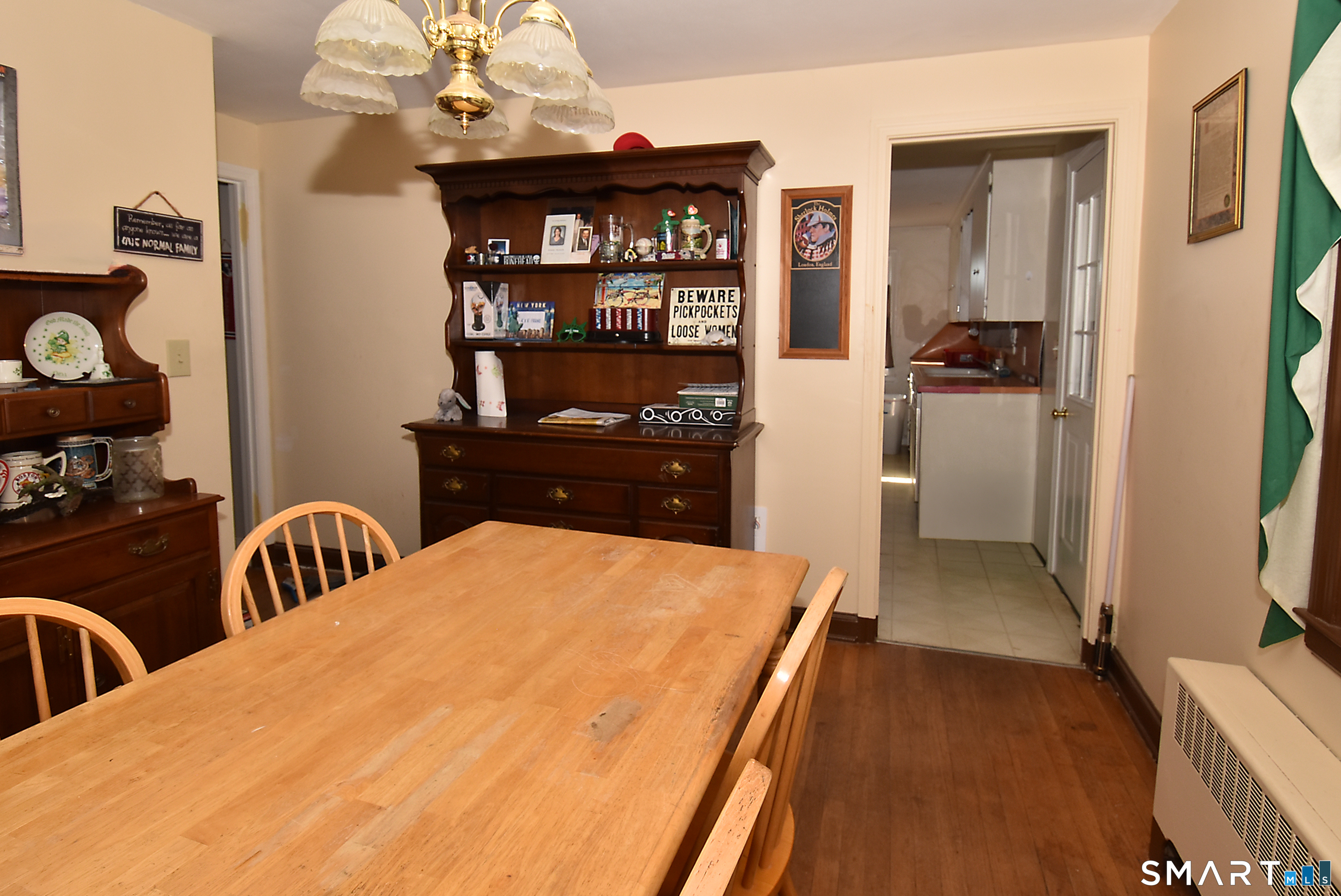 3 French Road Manchester, CT 06042 - Photo 12 of 20 a bedroom with a bed and dresser with racks