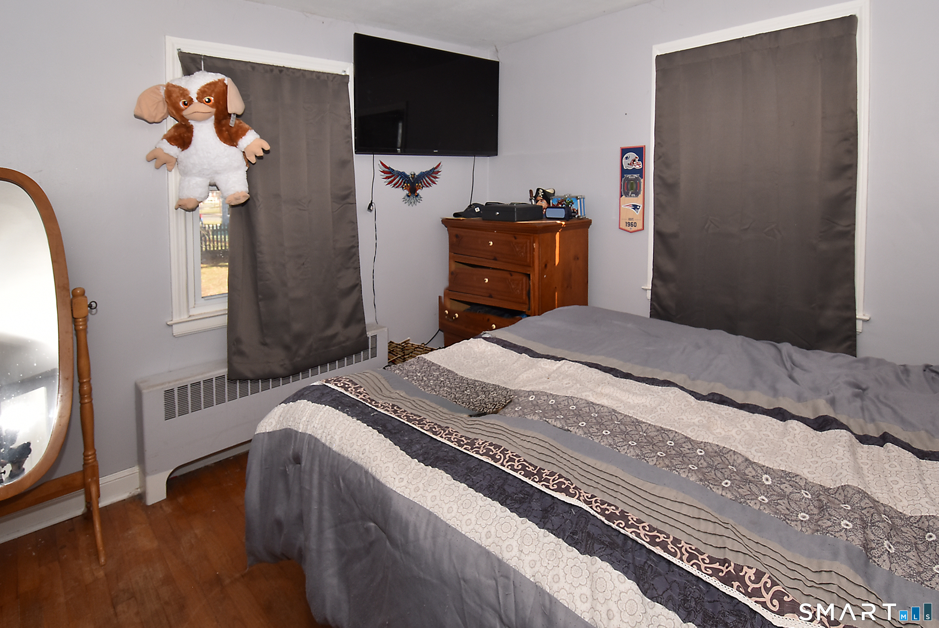 3 French Road Manchester, CT 06042 - Photo 13 of 20 a bedroom with a bed and wooden floor