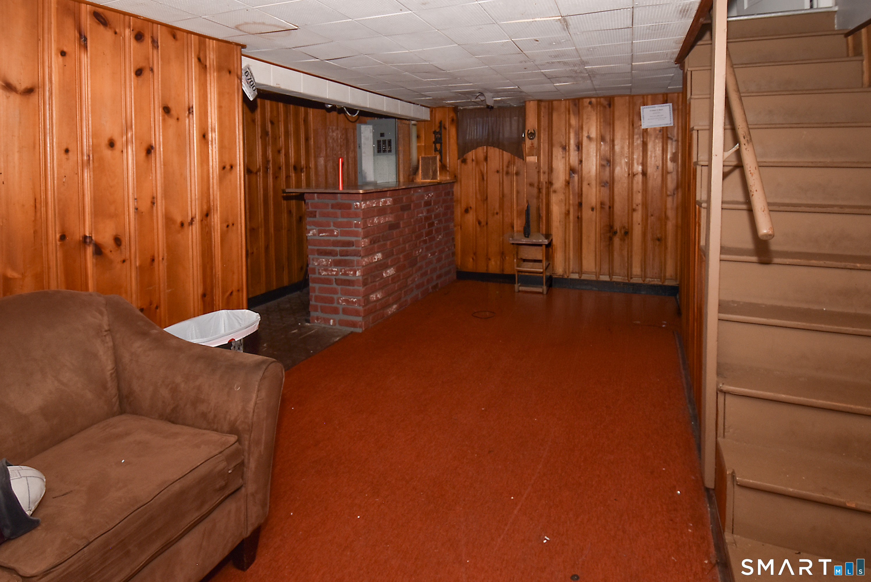 3 French Road Manchester, CT 06042 - Photo 17 of 20 a view of a livingroom with furniture and staircase