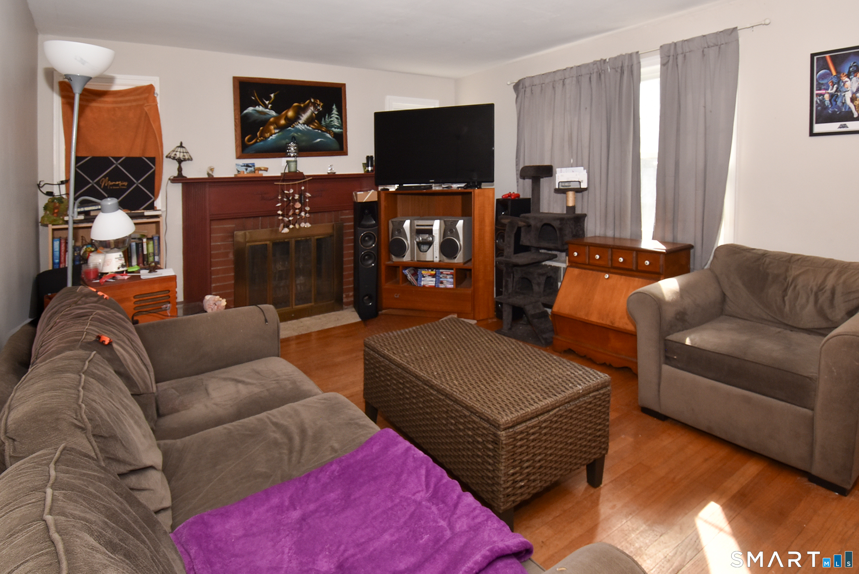 3 French Road Manchester, CT 06042 - Photo 6 of 20 a living room with furniture and a flat screen tv