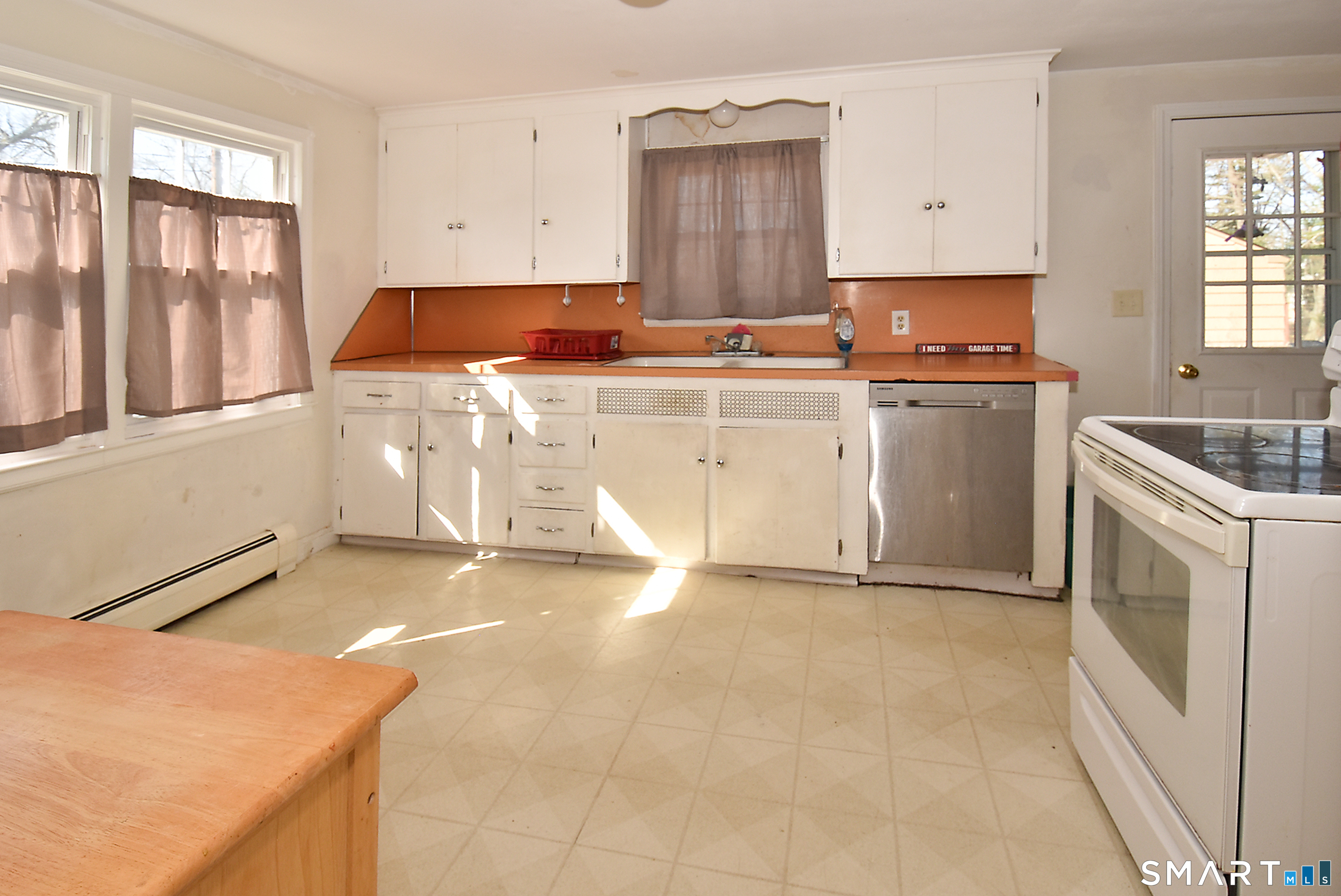 3 French Road Manchester, CT 06042 - Photo 7 of 20 a kitchen with stainless steel appliances granite countertop a stove a sink and a microwave