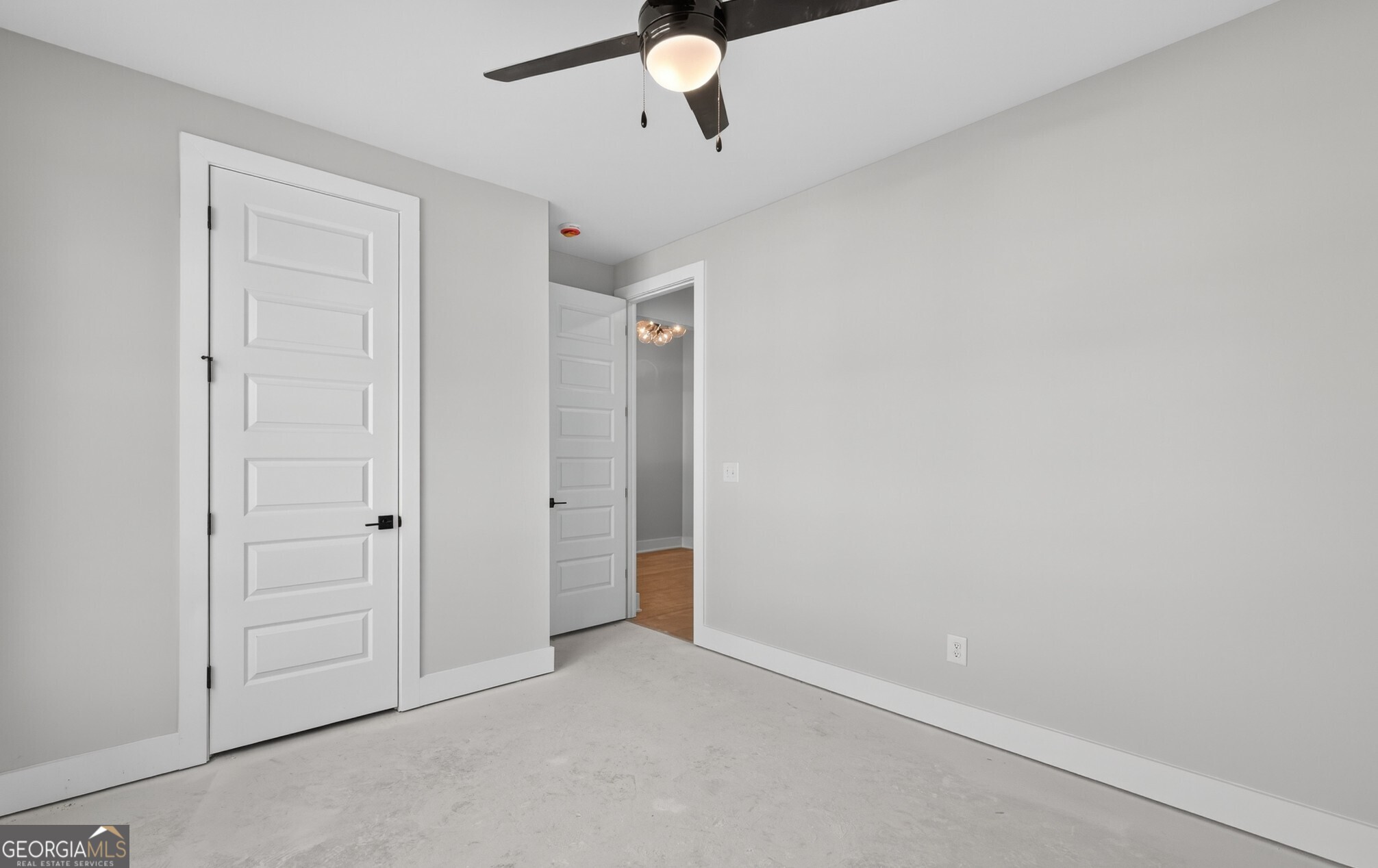 132 Patillo Manor, Unit 8 Stockbridge, GA 30281 - Photo 23 of 36 an empty room with closet area
