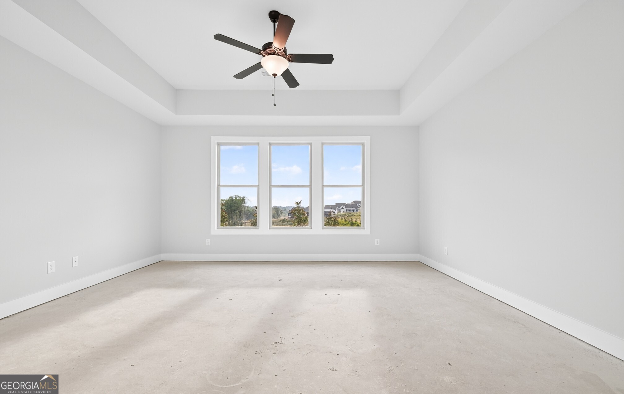 132 Patillo Manor, Unit 8 Stockbridge, GA 30281 - Photo 24 of 36 a view of an empty room with a window