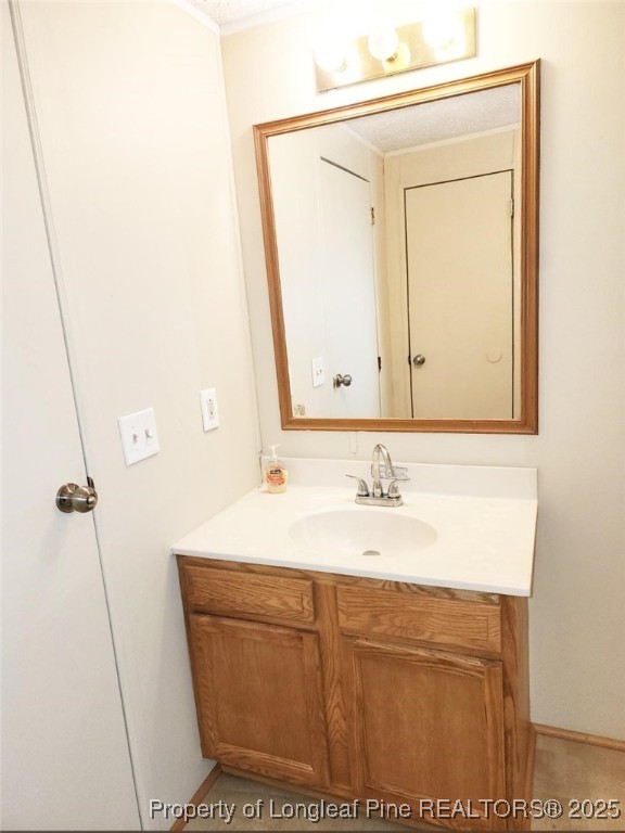 420 Pine Tree Road Lumberton, NC 28360 - Photo 13 of 18 a bathroom with a sink and a mirror