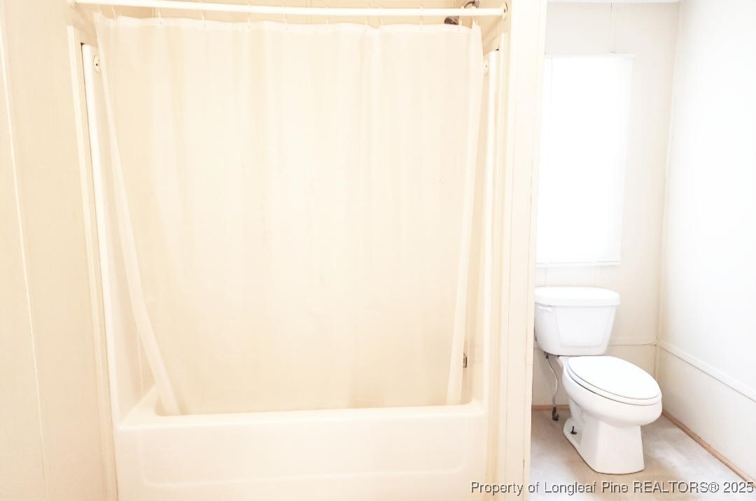 420 Pine Tree Road Lumberton, NC 28360 - Photo 14 of 18 a white toilet sitting next to a white sink