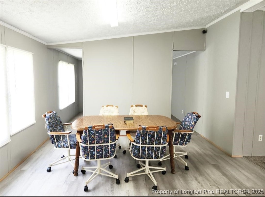 420 Pine Tree Road Lumberton, NC 28360 - Photo 18 of 18 a view of a dining room with furniture and window