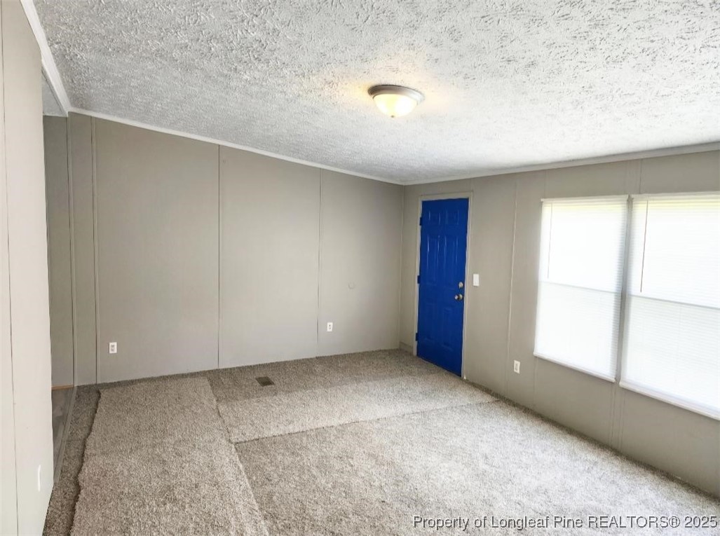 420 Pine Tree Road Lumberton, NC 28360 - Photo 4 of 18 an empty room with a window