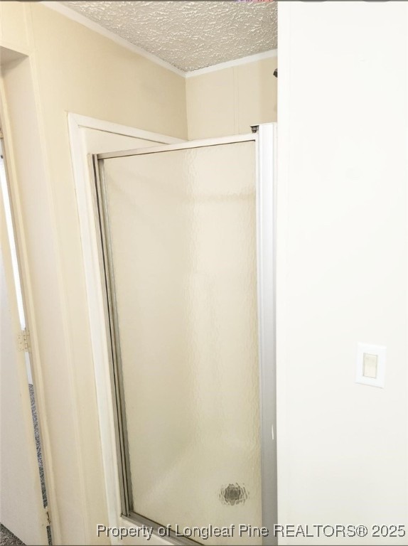 420 Pine Tree Road Lumberton, NC 28360 - Photo 9 of 18 a bathroom with a glass shower door