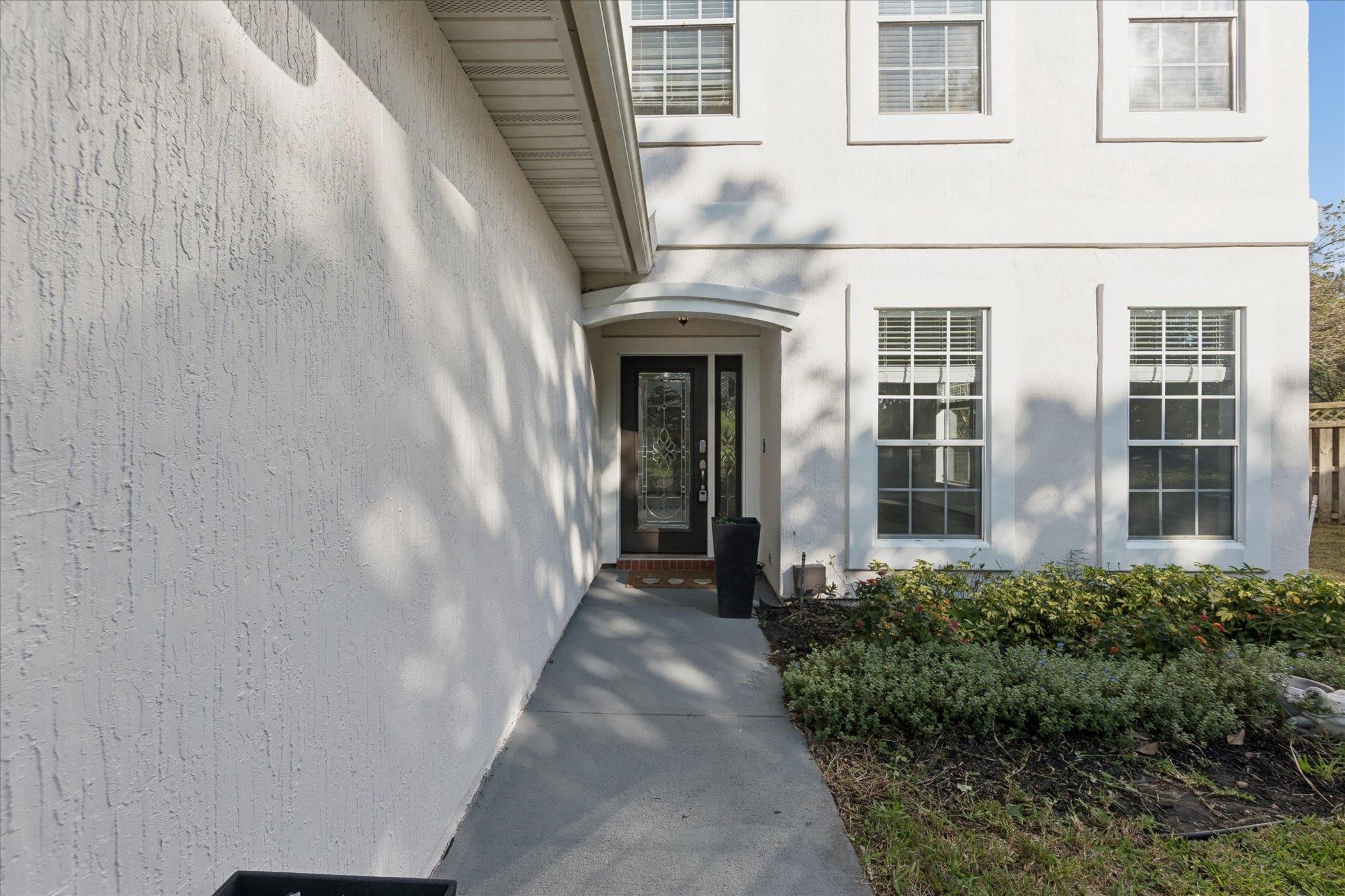 140 Corral Circle St. Augustine, FL 32092 - Photo 18 of 46 a view of a brick house with a large window