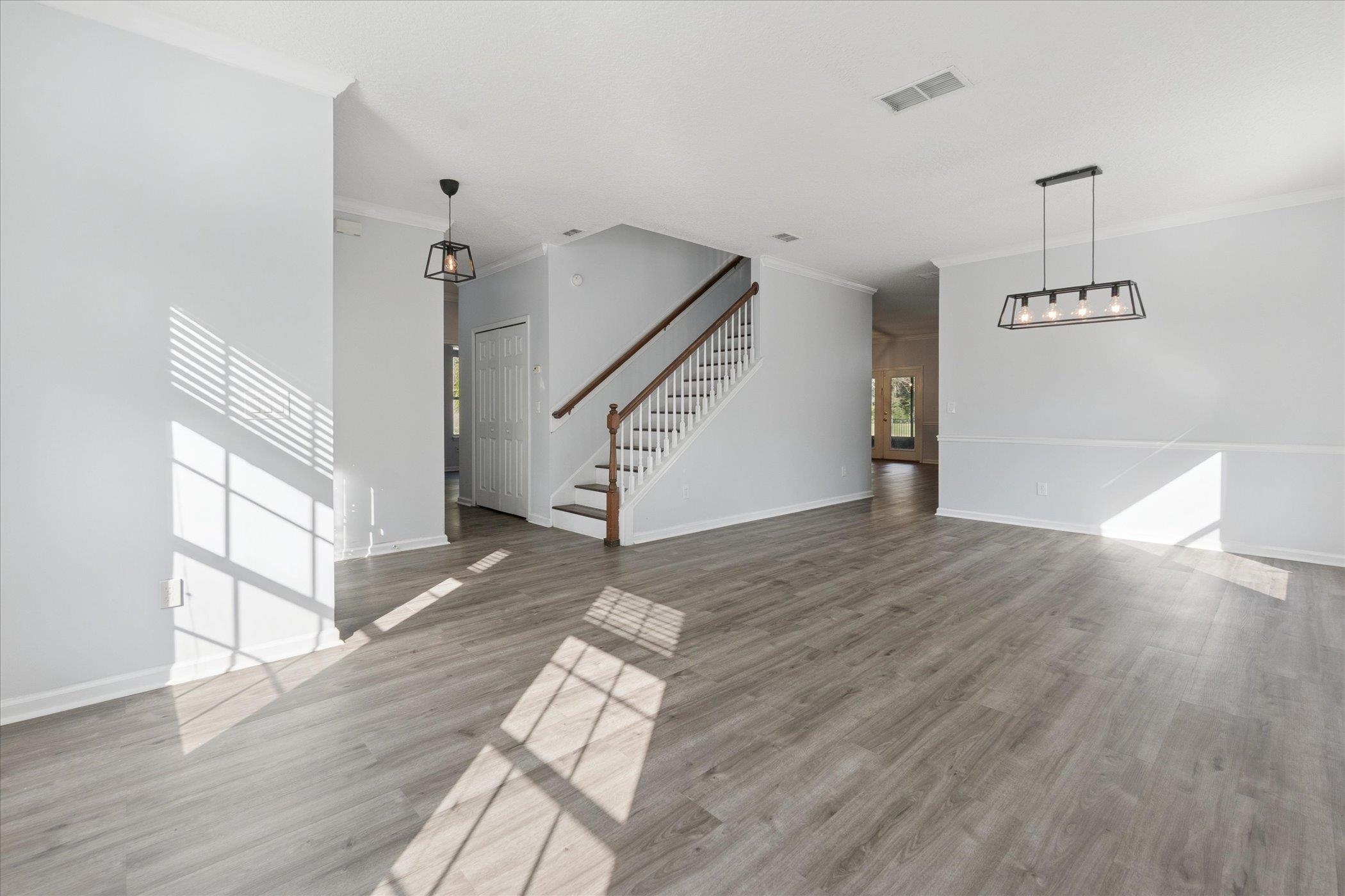 140 Corral Circle St. Augustine, FL 32092 - Photo 22 of 46 a view of entryway and hall with wooden floor