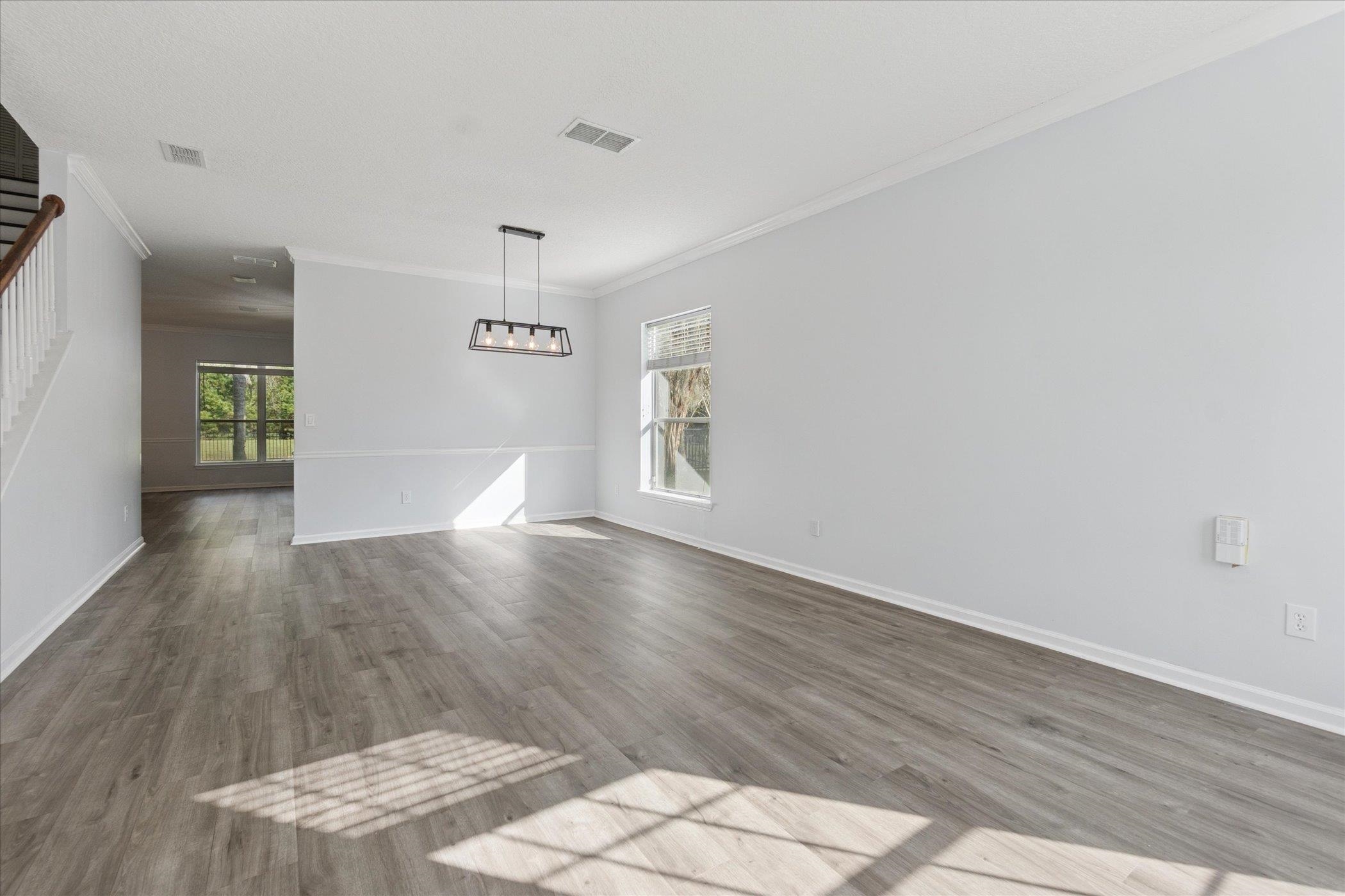 140 Corral Circle St. Augustine, FL 32092 - Photo 8 of 46 a view of livingroom with hardwood floor and hallway