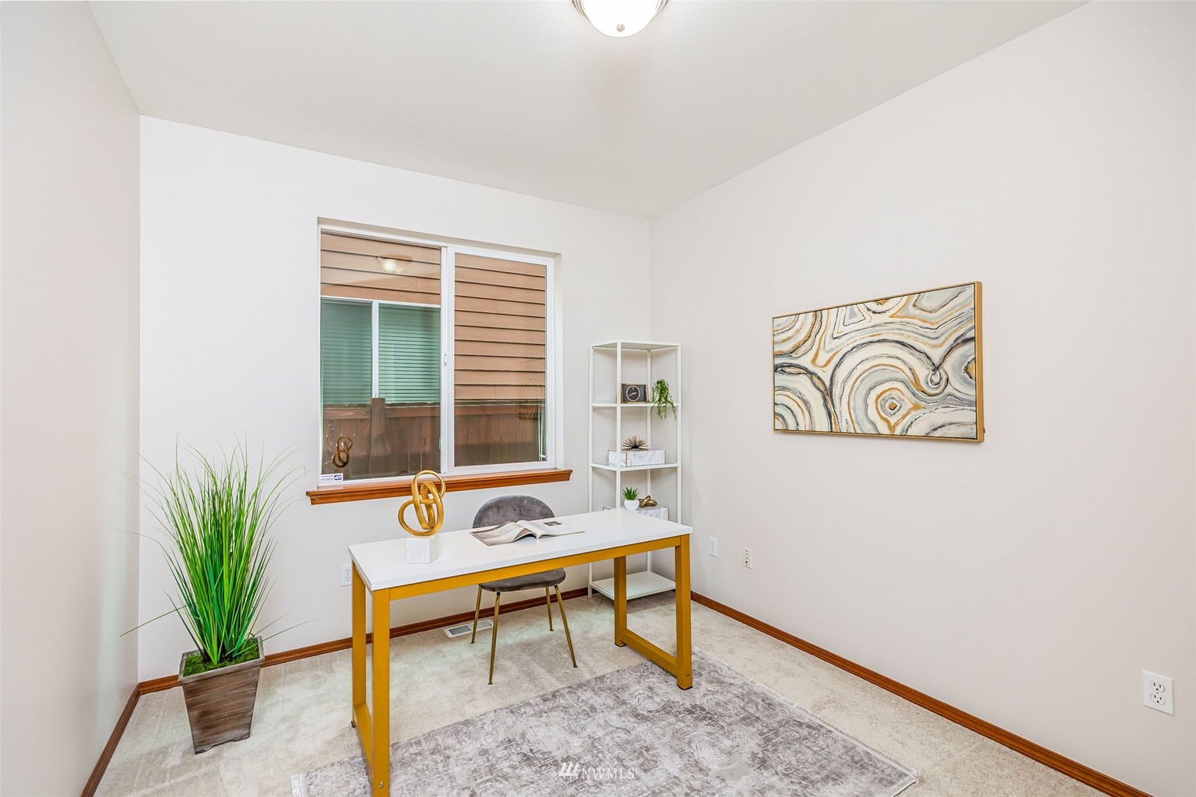 3331 182nd Place Southeast Bothell, WA 98012 - Photo 5 of 29 a living room with furniture and a potted plant