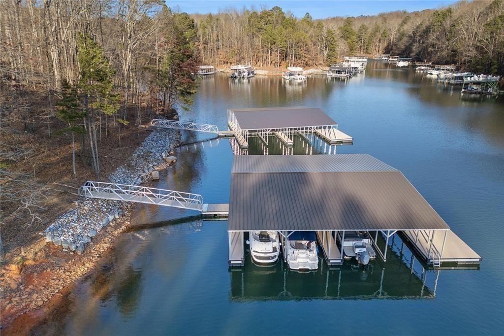 8355 Beryl Gainesville, GA 30506 - Photo 7 of 11 an aerial view of residential houses with outdoor space and lake view
