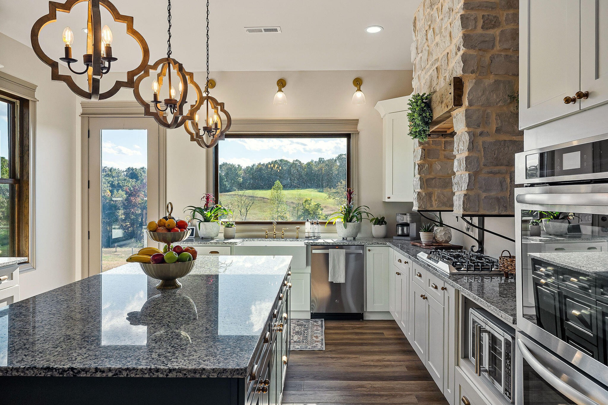 1656 Dibrell-Lucky Road McMinnville, TN 37110 - Photo 19 of 62 a kitchen with stainless steel appliances granite countertop a sink stove and cabinets
