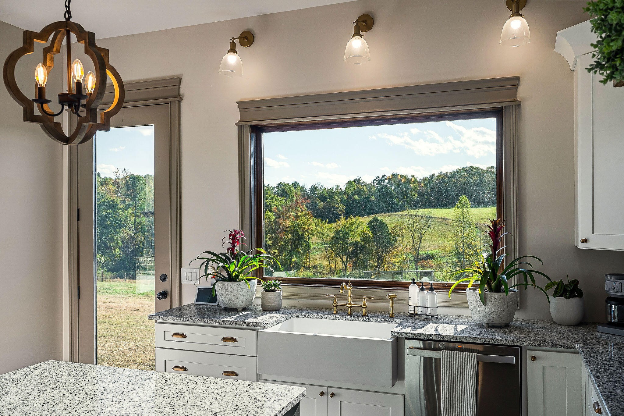 1656 Dibrell-Lucky Road McMinnville, TN 37110 - Photo 20 of 62 a kitchen with stainless steel appliances granite countertop a stove a sink and a granite counter top