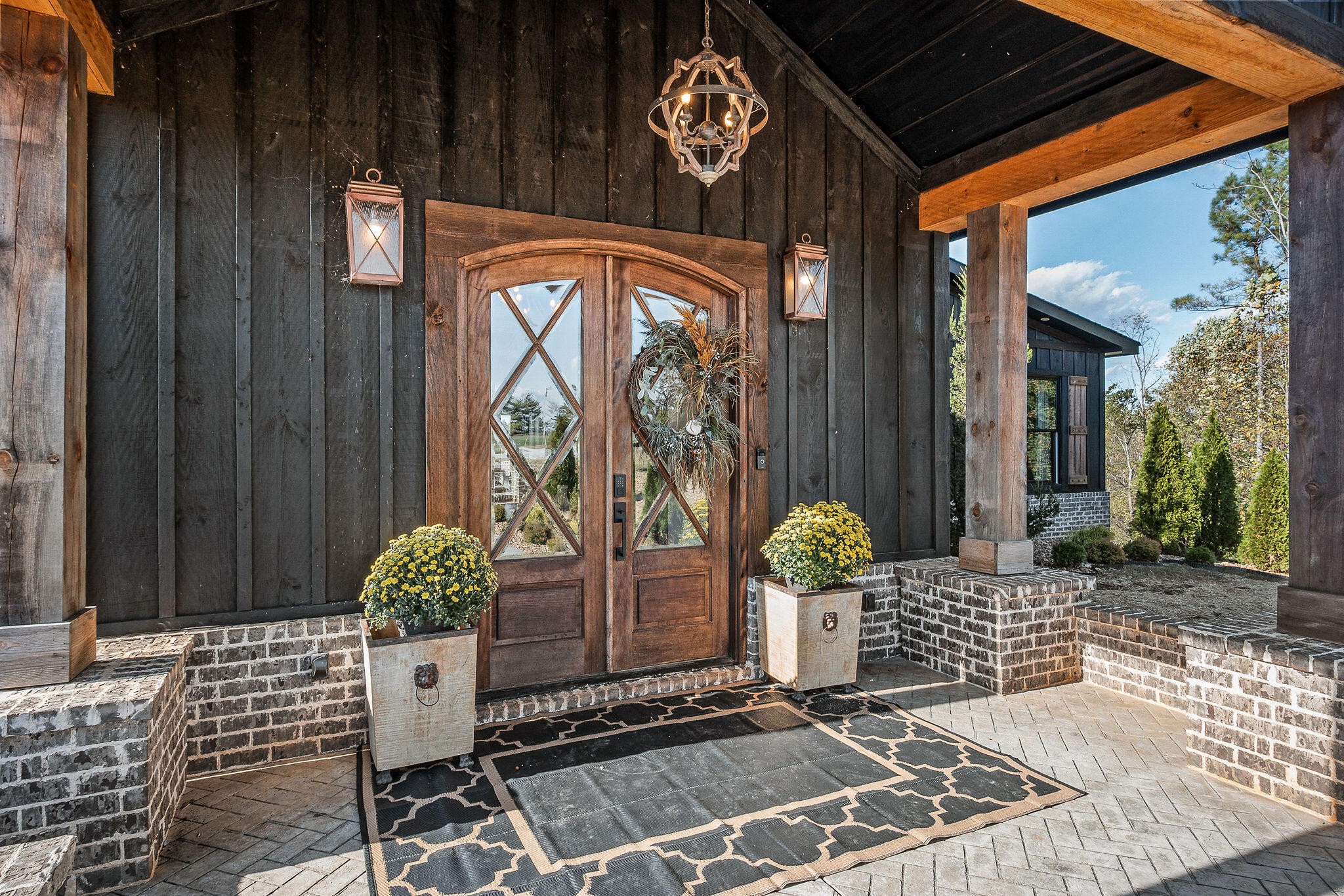 1656 Dibrell-Lucky Road McMinnville, TN 37110 - Photo 3 of 62 a view of porch with a table and chairs and potted plants