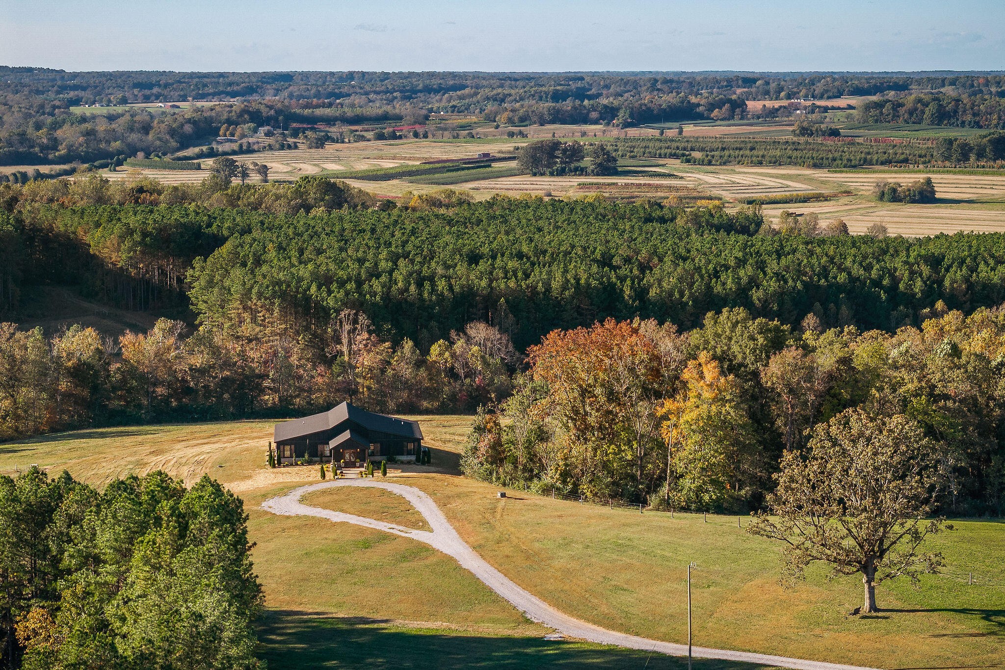 1656 Dibrell-Lucky Road McMinnville, TN 37110 - Photo 5 of 62 a view of a lake with a yard and outdoor seating