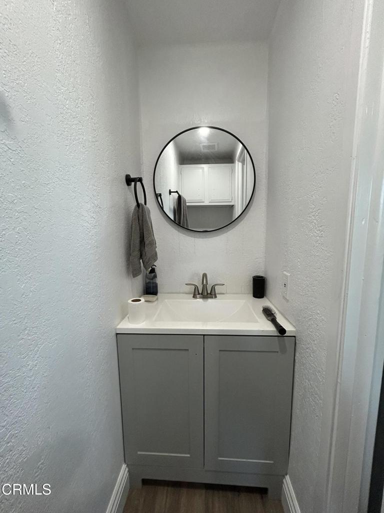 250 East Telegraph Road, Unit 184 Fillmore, CA 93015 - Photo 11 of 16 a bathroom with a sink and a mirror