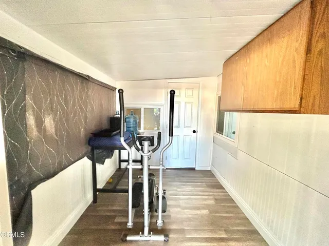 a view of entryway with wooden floor