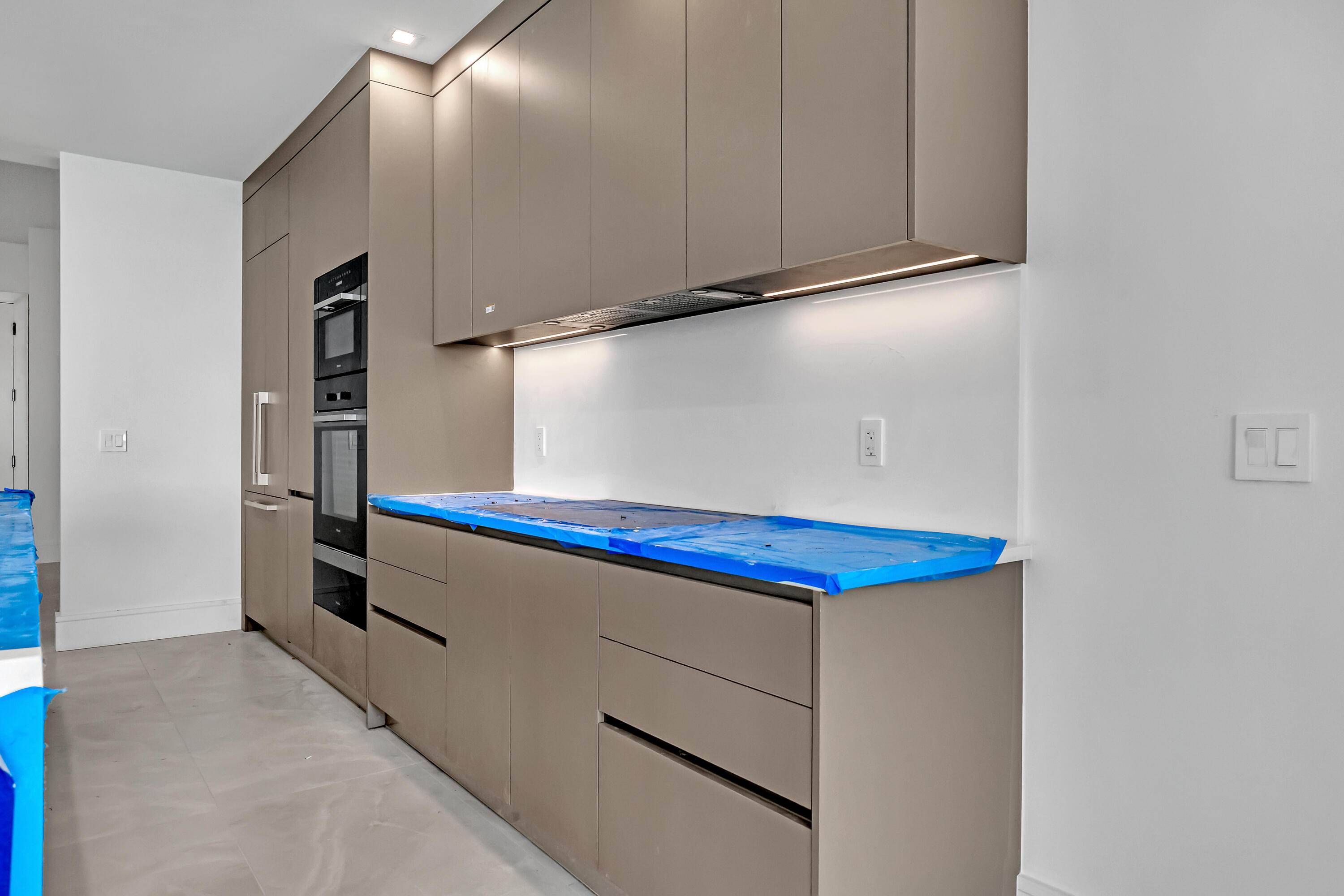 220 Lake Shore Drive, Unit N2103 Lake Park, FL 33403 - Photo 13 of 57 a view of a air conditioner and an entryway