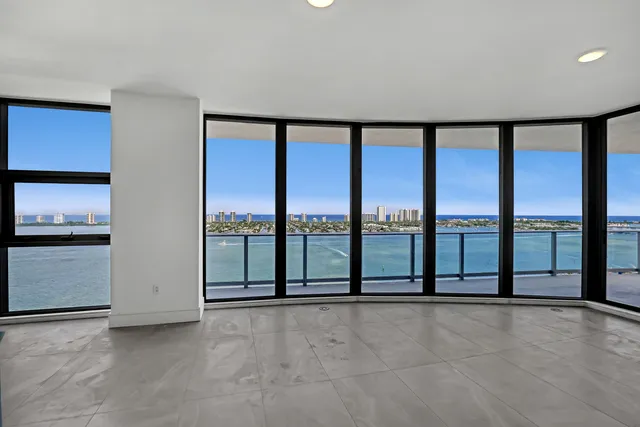 a view of an empty room with a large window